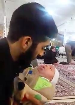 عکس شهید حججی و پسرش