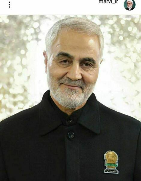 عکس سلیمانی با امام حسین