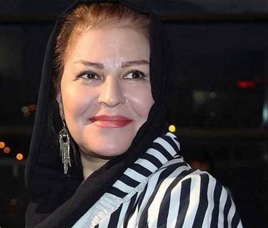 عکس از اکرم محمدی و همسرش