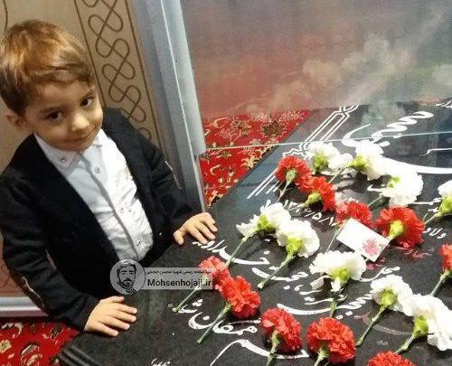 عکس شهید محسن حججی و پسرش