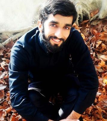 عکس شهید حججی با لباس نظامی