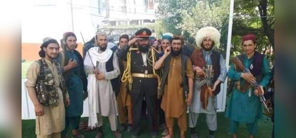 عکس طالبان با لباس دوستم