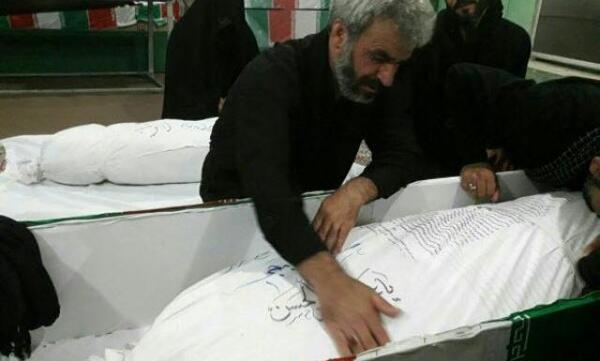 عکس غسل دادن شهید حججی