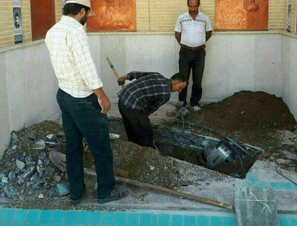 عکس غسل دادن شهید حججی