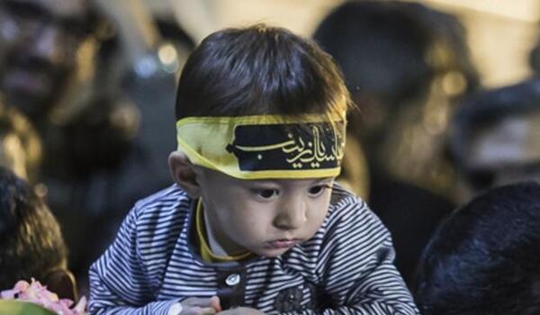 عکس شهید حججی و فرزندش