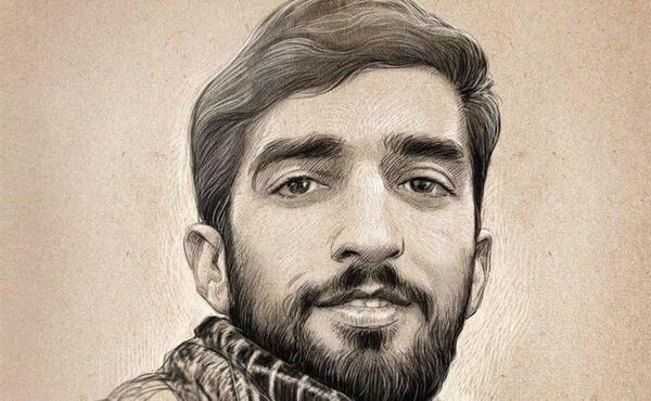 عکس شهید حججی با لباس پاسداری
