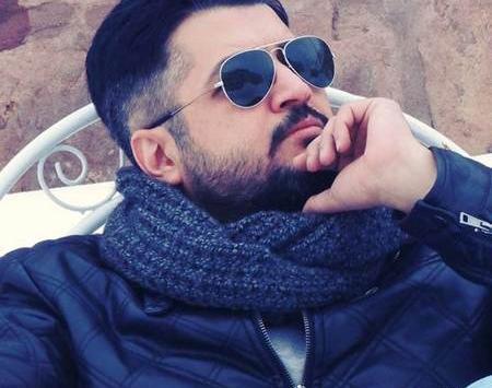 عکس عبدالرضا اکبری با پسرش