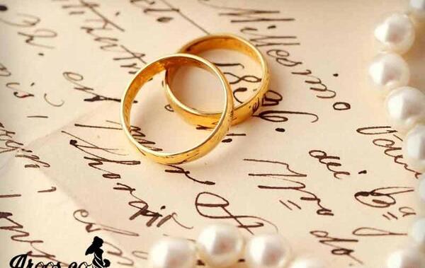 عکس حلقه ازدواج و پستانک