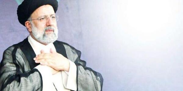 عکس رئیسی خادم الرضا