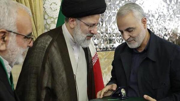 عکس رئیسی خادم الرضا