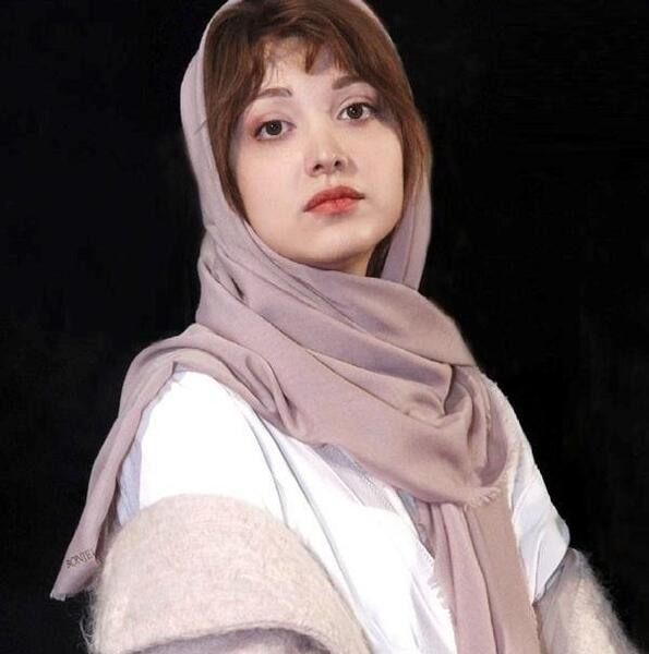عکس روشنک گرامی و همسرش