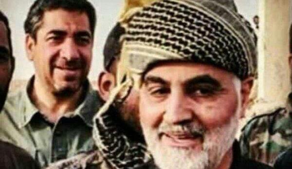 عکس حاج قاسم سلیمانی با لباس کردی