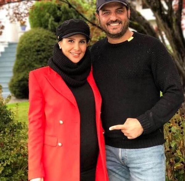 عکس سام درخشانی با فرزندش