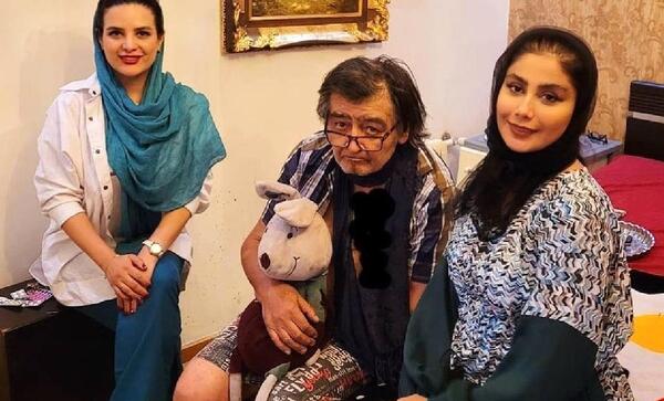عکس رضا رویگری روی ویلچر