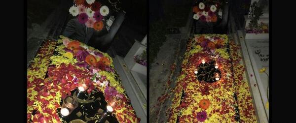 عکس سنگ قبر پر از گل