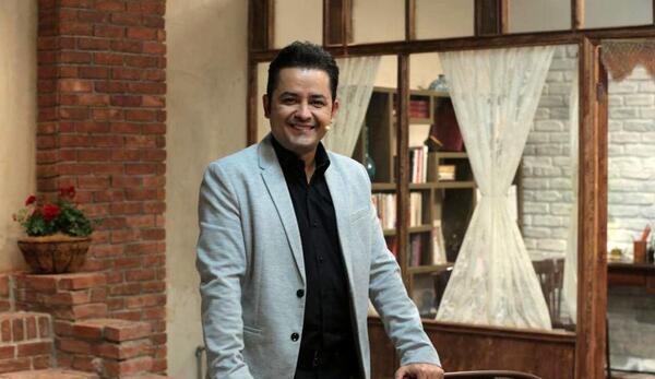 عکس مجری افشین زی نوری