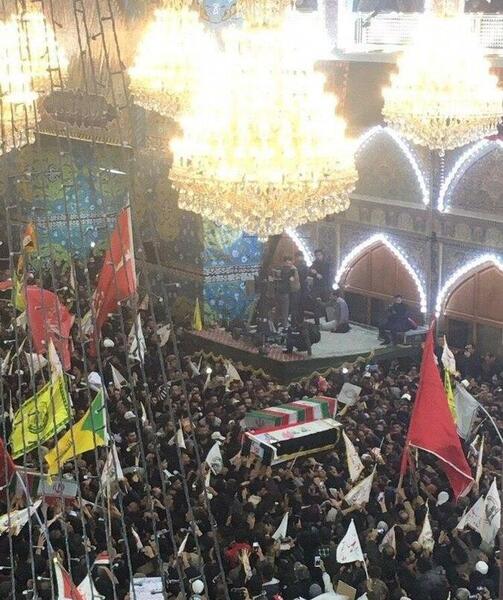 عکس قاسم سلیمانی بغل امام حسین
