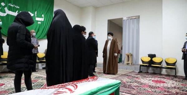 عکس شهید فخری زاده در تابوت