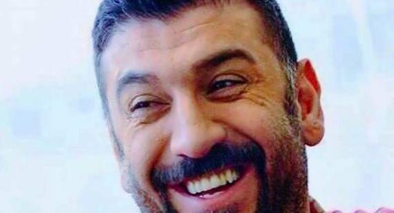 عکس علی انصاریان با خنده