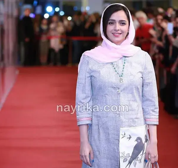 عکس ترانه علیدوستی و همسرش روی فرش قرمز