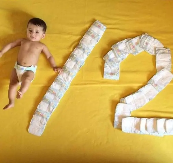 عکس ماهگرد نوزاد با شمع
