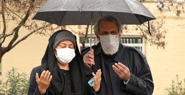 عکس از پرویز پورحسینی و همسرش