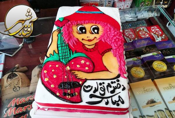 عکس نقاشی دختر روی کیک