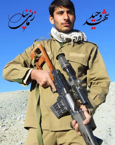 عکس حاج قاسم سلیمانی با تفنگ