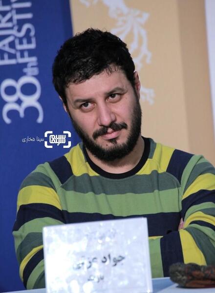 عکس جواد عزتی در شنای پروانه