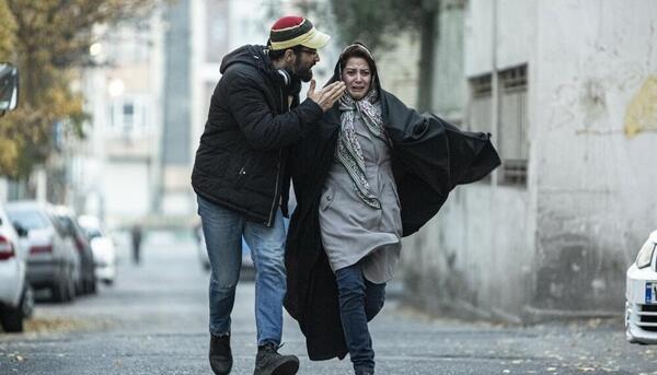 عکس جواد عزتی در شنای پروانه