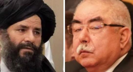 عکس طالبان با لباس نارنجی