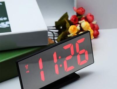 عکس ساعت آینه ای