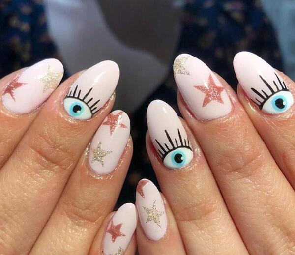 عکس طراحی ناخن چشم نظر
