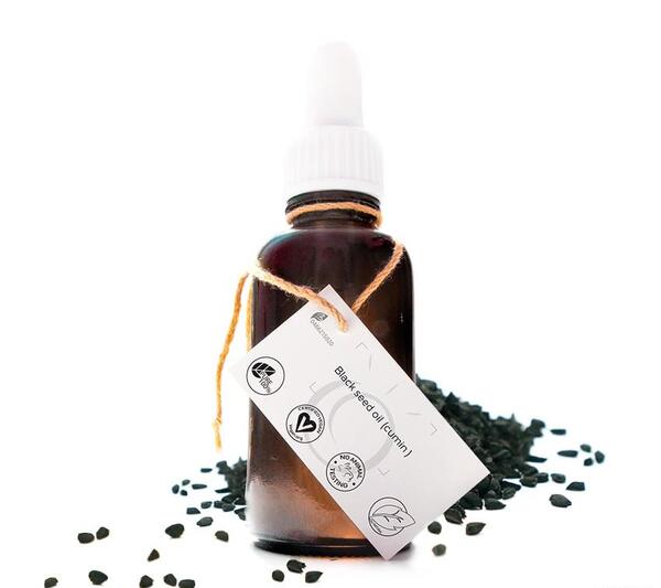 عکس روغن سیاه دانه اصل