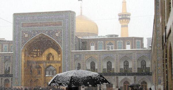 عکس حرم امام رضا روز برفی