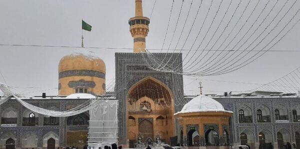 عکس حرم امام رضا روز برفی