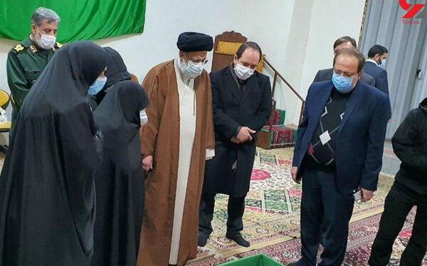 عکس رئیسی با شهید فخری زاده