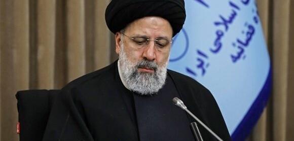 عکس رئیسی با شهید فخری زاده