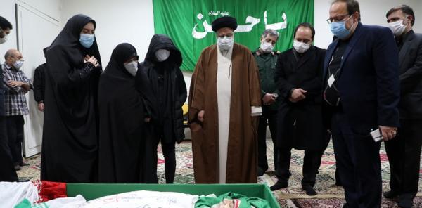 عکس رئیسی با شهید فخری زاده