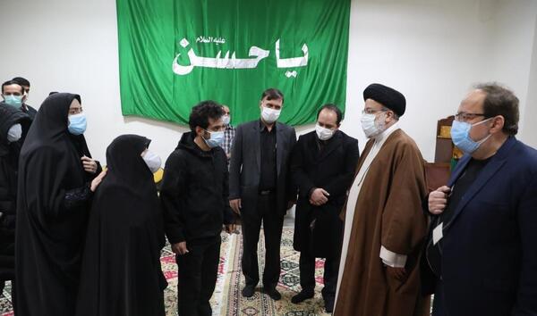 عکس رئیسی با شهید فخری زاده