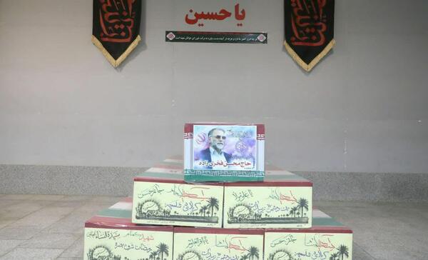 عکس رئیسی با شهید فخری زاده