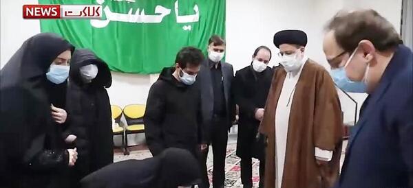 عکس رئیسی با شهید فخری زاده