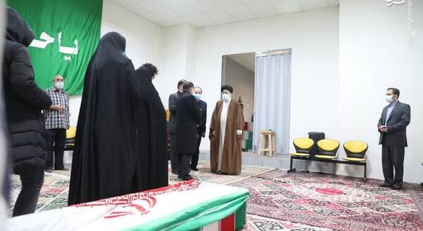 عکس رئیسی با شهید فخری زاده
