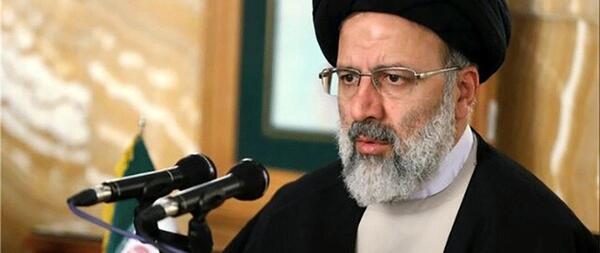 عکس رئیسی با شهید فخری زاده