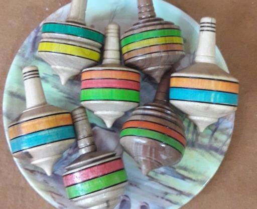 عکس فرفره چوبی طلایی