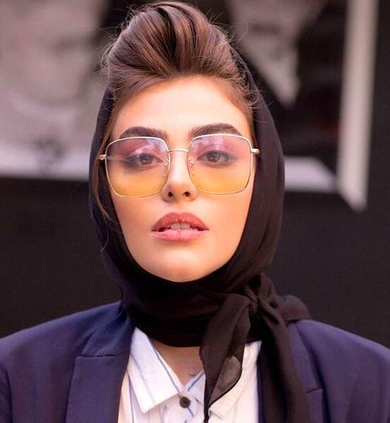 عکس ریحانه پارسا در آغوش همسرش