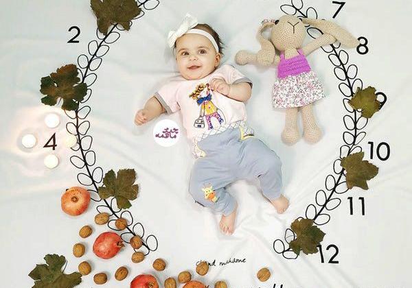 ایده عکس یک ماهگی نوزاد با میوه