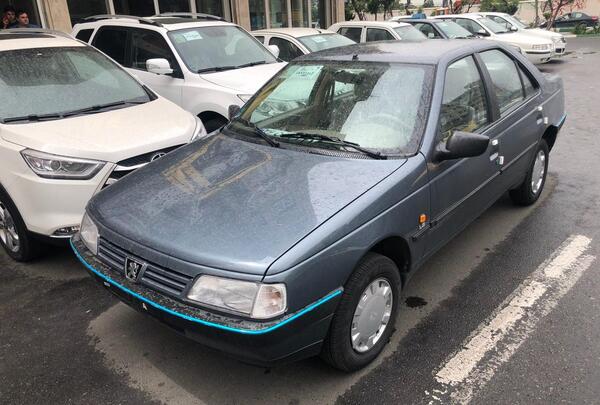 عکس پژو خاکستری
