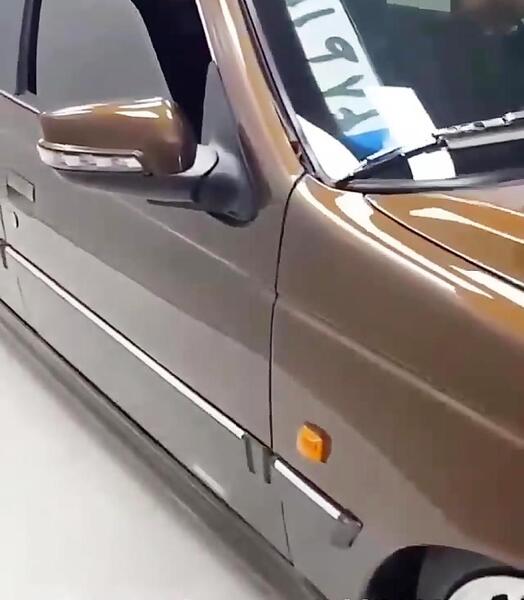 عکس پژو قهوه ای