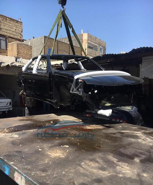 عکس پژو مشکی تصادفی